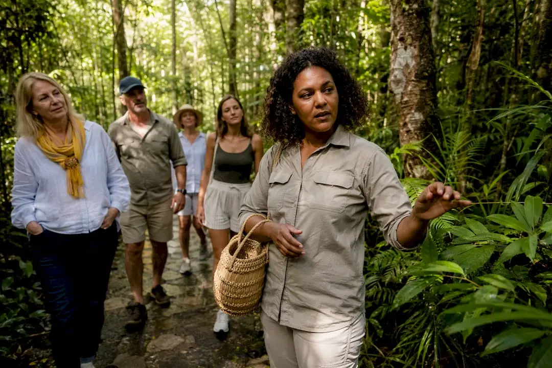 Traditional Owner guiding rainforest cultural walk